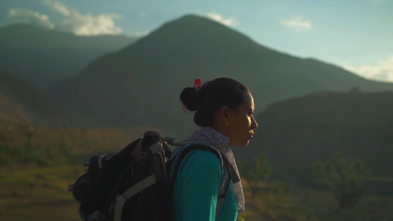 An MSI Lady names Durga treks in the Himalaya carrying a backpack of family planning supplies