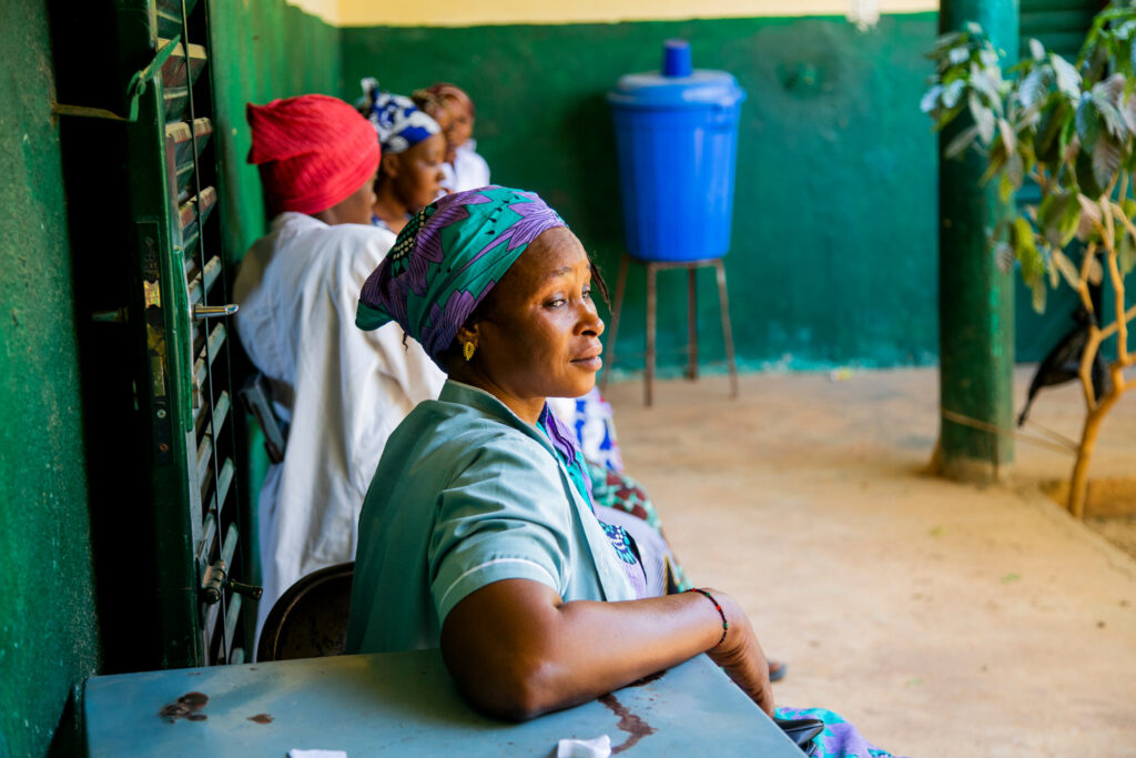 Salimata Diarra, a 38-year-old married mother of six who has been working as a matron at the Community Health Centre for over 10 years, sits at the centre in Nionssombougou, Kolonaki, Mali.
