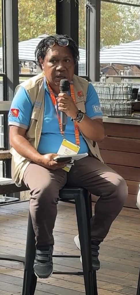 Nancy speaking to a group